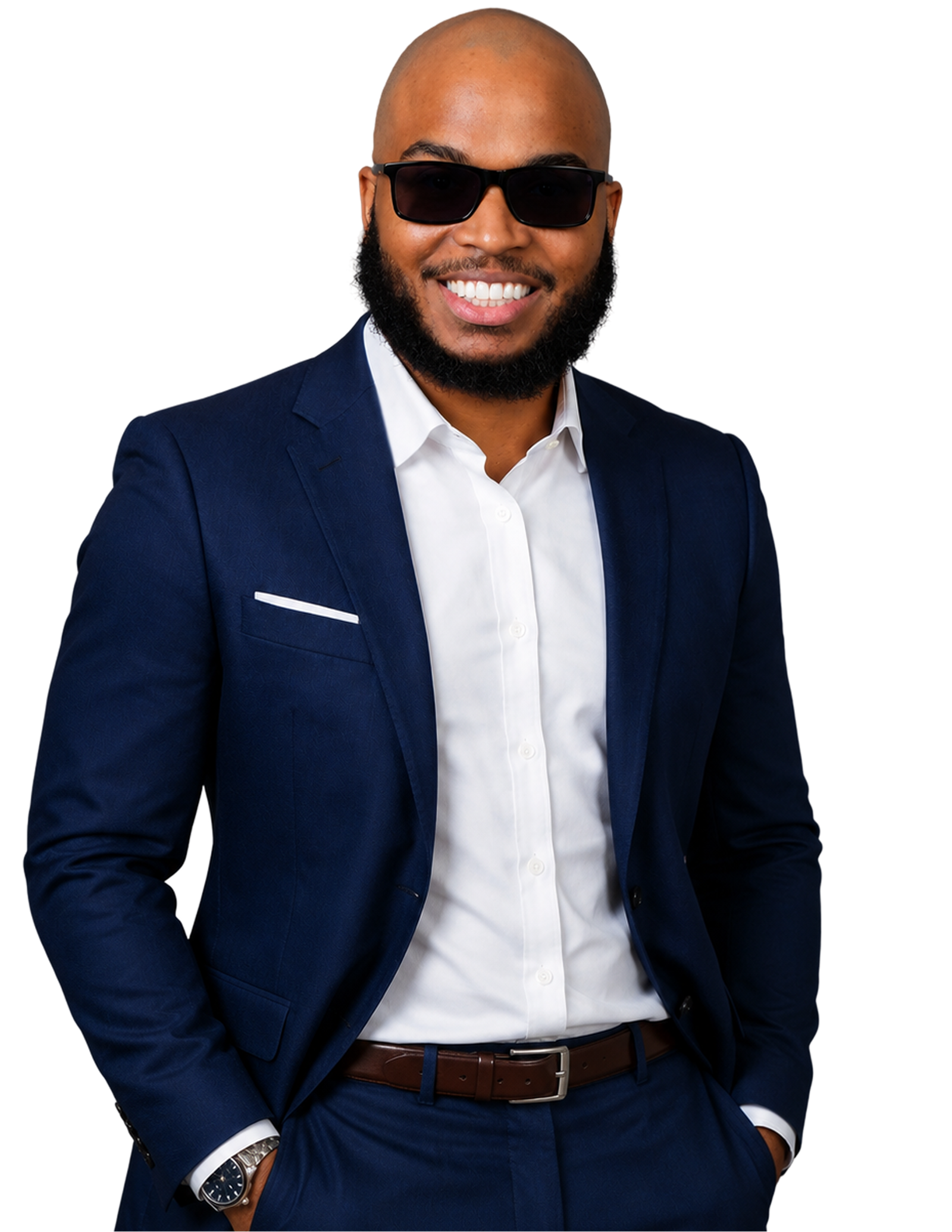 Justin Mitchell, smiling in a navy suit